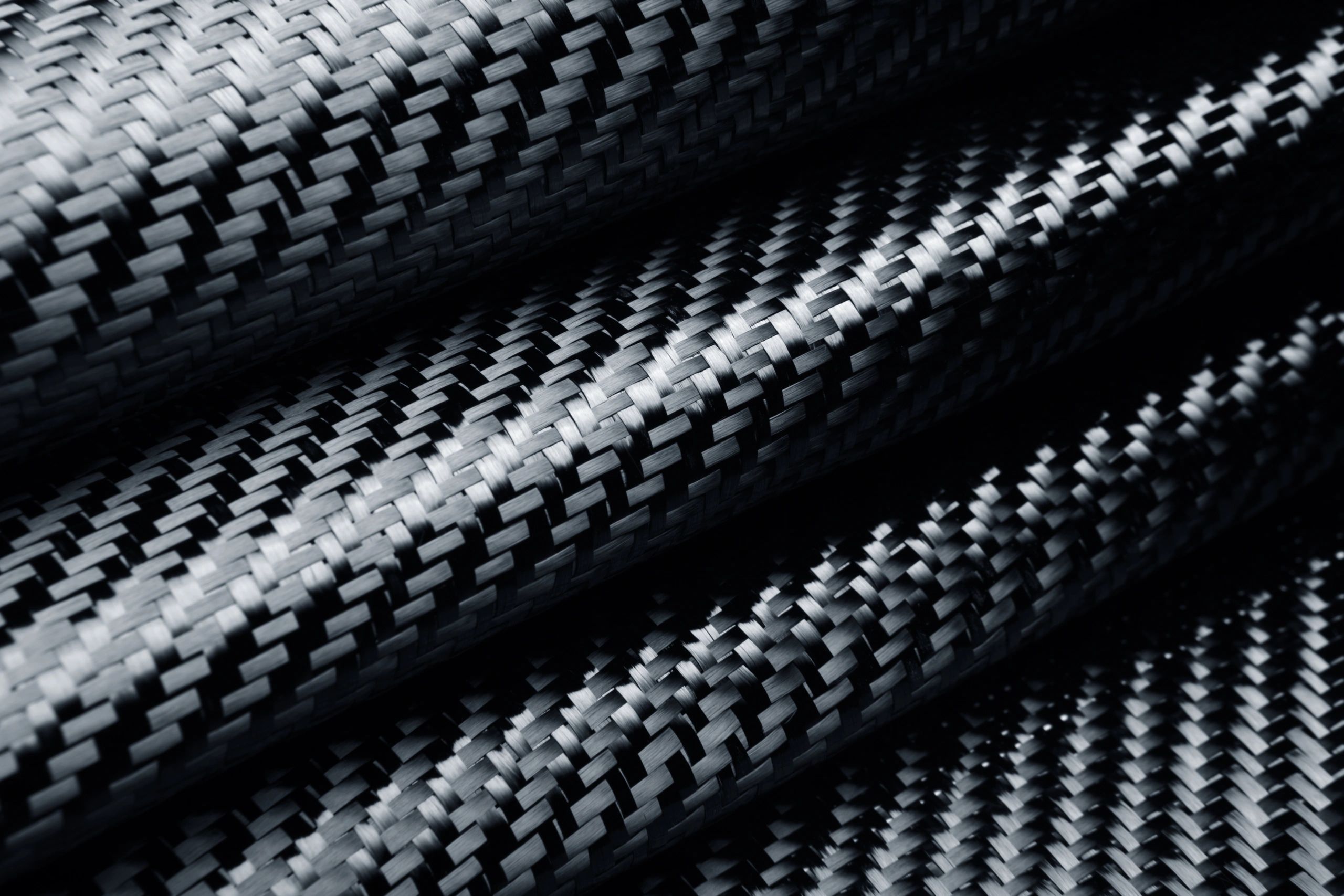 Folded raw carbon fiber cloth texture